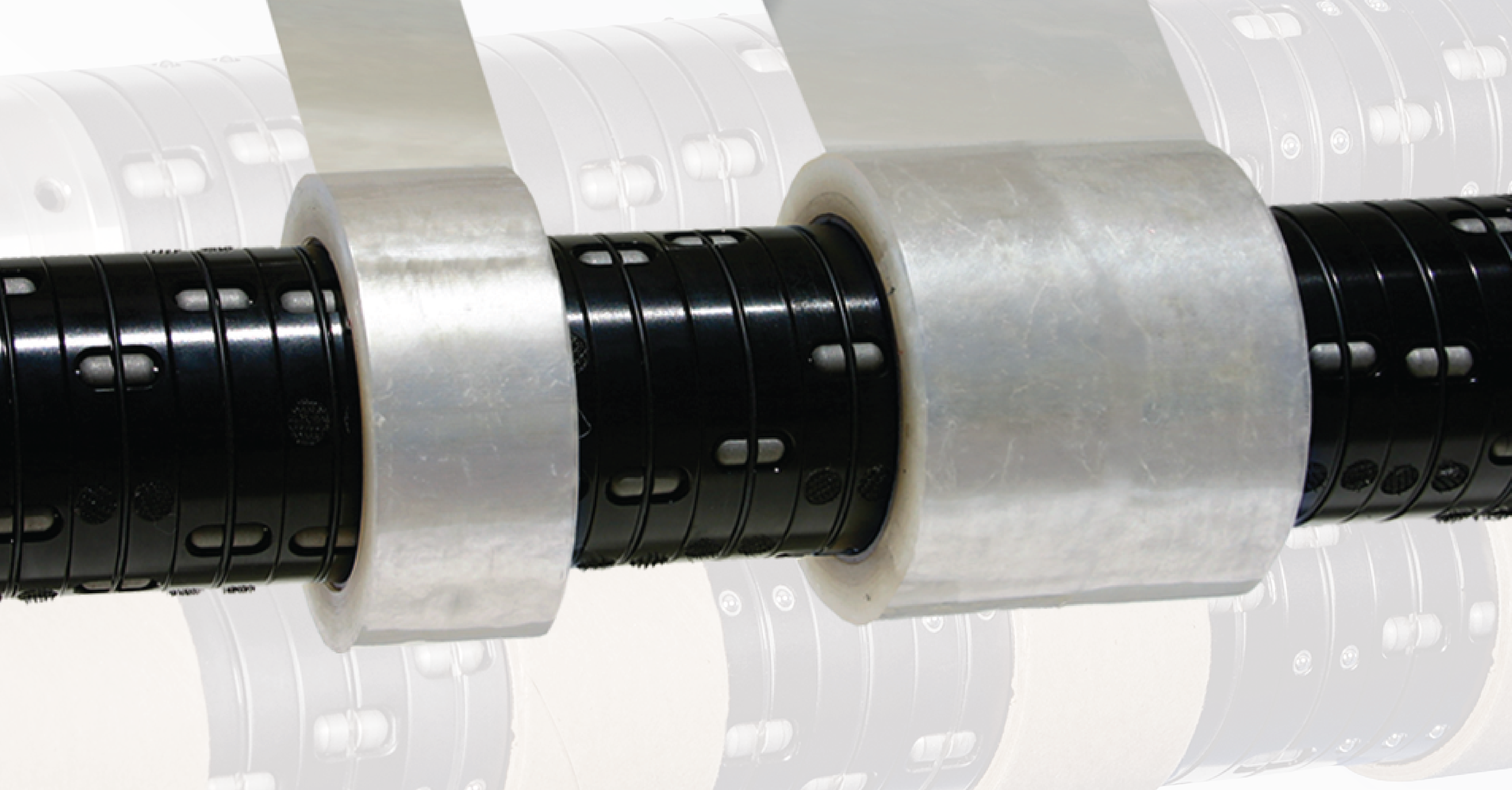 Differential winding shaft holding multiple slit rolls for independent tension control