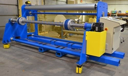 Heavy duty unwind stand with core shaft and large diameter bladder chucks